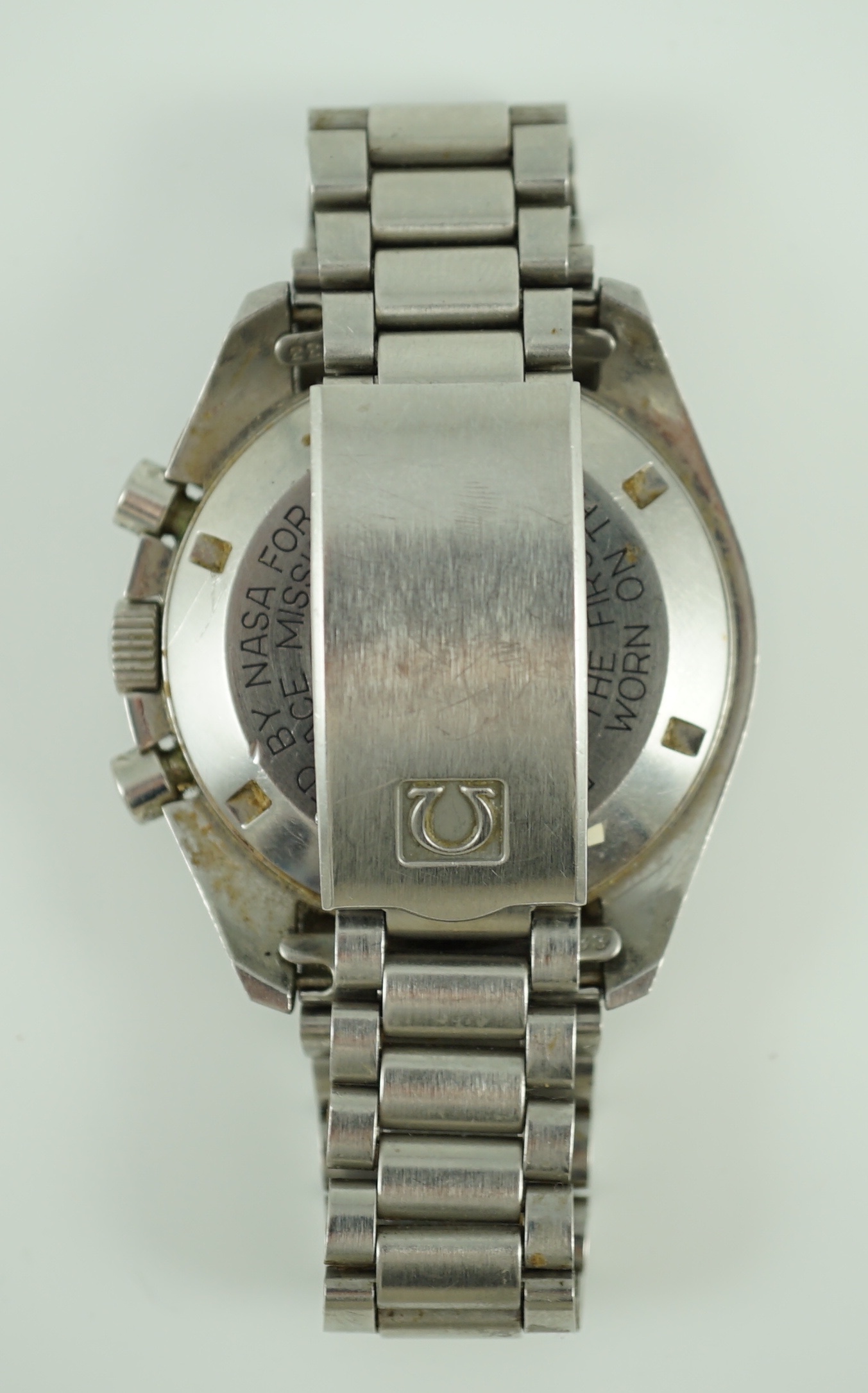 A gentleman's early 1980's stainless steel Omega Speedmaster Professional 'The First Watch Worn On The Moon' manual wind wrist watch, on stainless steel Omega bracelet